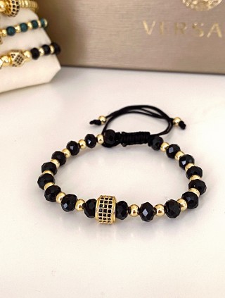 Bratara dama model deosebit cu margele aurii si negre si design cerc