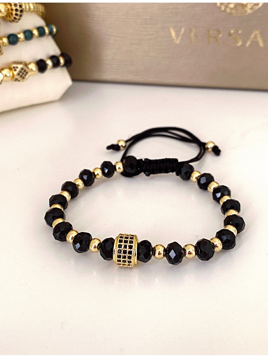 Bratara dama model deosebit cu margele aurii si negre si design cerc