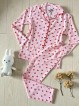 Pijama dama ieftina din bumbac cu pantaloni lungi si bluza roz cu imprimeu fundite