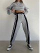 Pantaloni dama casual gri tip jogger cu dungi laterale negre