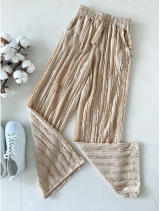 Pantaloni dama din bumbac bej cu aspect creponat foarte versatili
