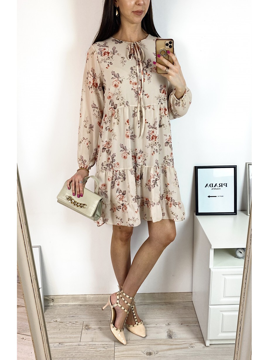 Rochie eleganta scurta crem cu volanase, maneci lungi si flori mici Rochie eleganta scurta crem cu volanase, maneci lungi si flori mici