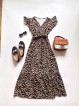 Rochie eleganta lunga neagra cu imprimeu animal print, volanase la maneci si cordon in talie